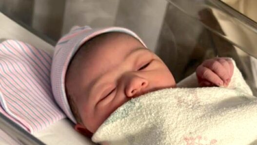 Snow day newborn baby