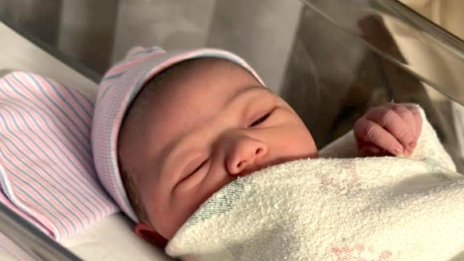 Snow day newborn baby